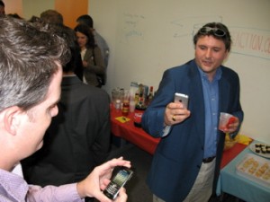 Looking at iPhone at Party